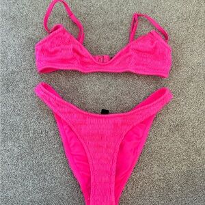 Hot Pink Triangl bathing suit. Top size small, bottom medium. Only worn once